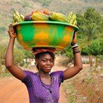 Woman carrying produce to market