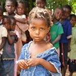 Girl in tattered dress