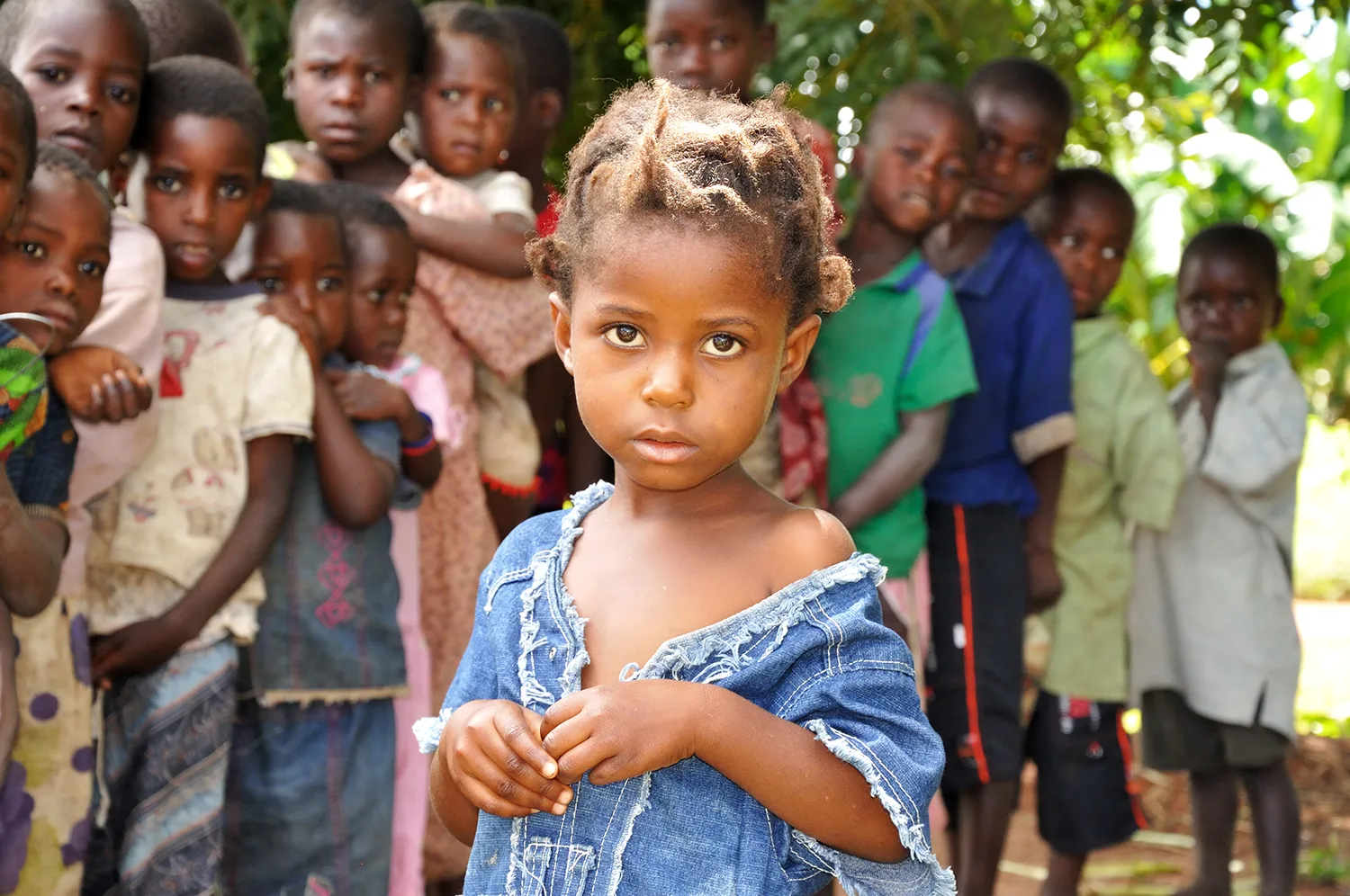 Girl in tattered dress